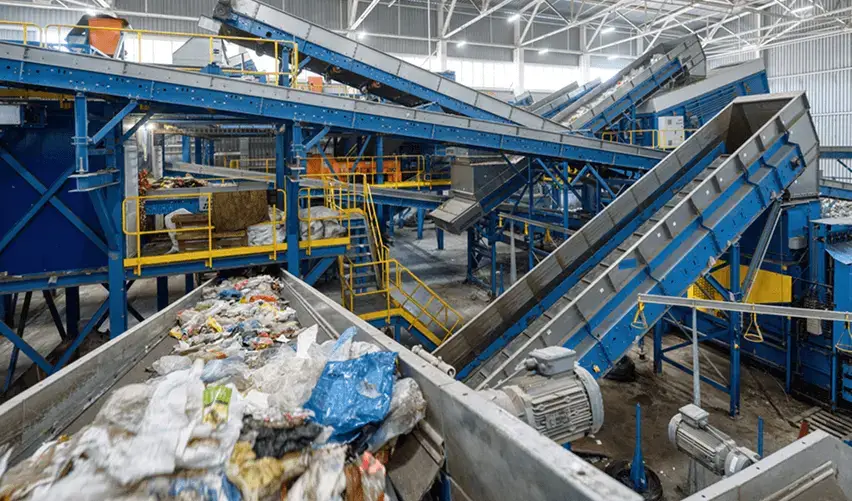 Industrial facility demonstrating plastic waste sorting and processing